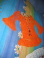 /album/foto-altri-tessuti/blusa-arancione-con-collana-jpg/